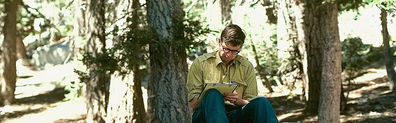 Theodore L Hullar, taking a moment to write his thoughts while participating in a week-long backpack expedition to my research field sites