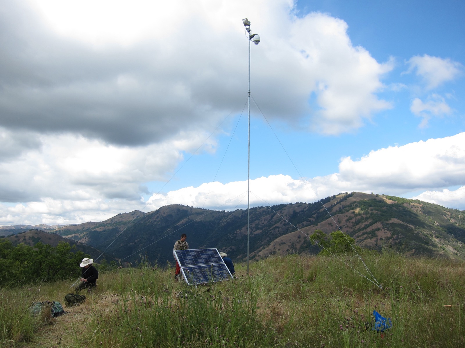students assisting me in installing a long-haul point to point WiFi network with integrated robotic cameras