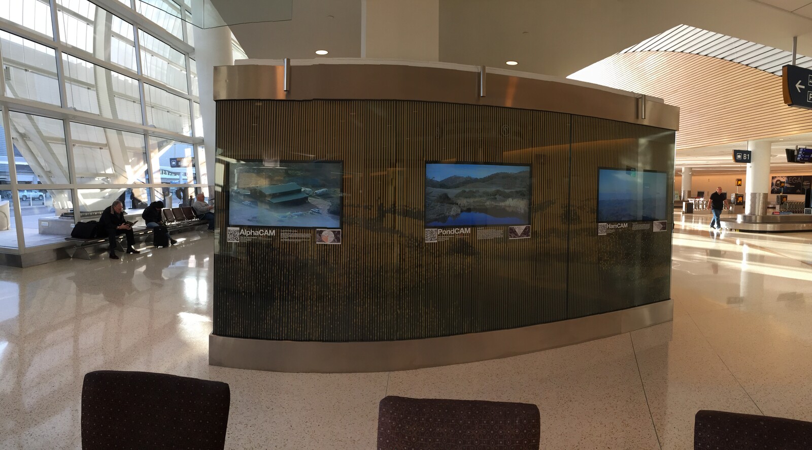 Climate Clock installation, San Jose Airport baggage terminal, 2009-2011. Phenology cameras at Blue Oak Ranch Reserve broadcast ecological time to travelers waiting for luggage.